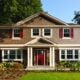A home with new siding and a freshly installed roof, showcasing a significant improvement in curb appeal in Northwest Ohio.